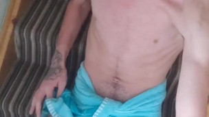 Walking around the house after a hot bath stroking my long cock and talking dirty